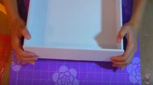 pegar piezas de la  caja scrapbook para el álbum 